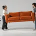 The task photo: an orange two-seat sofa.